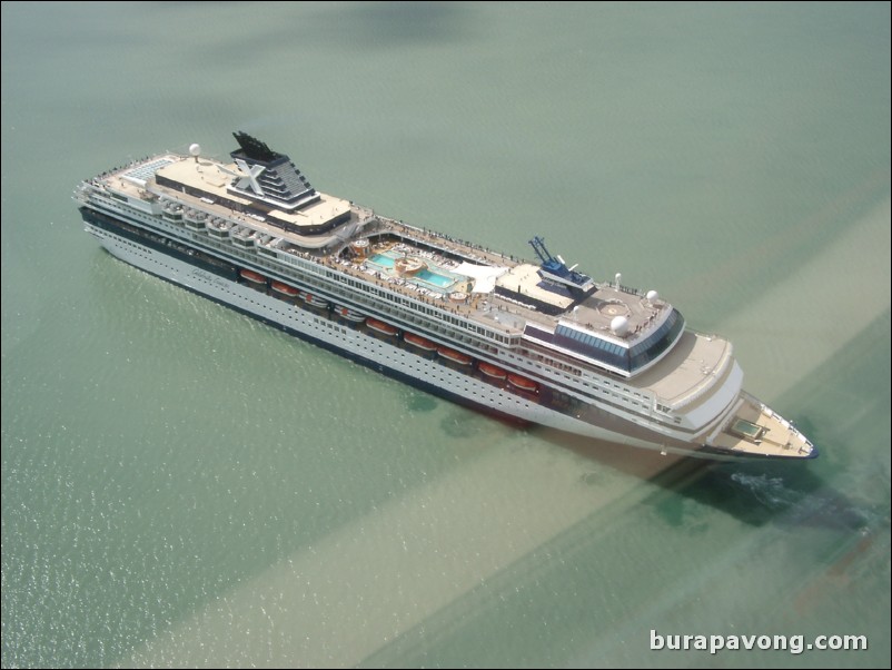 View of a cruise ship from above inside the helicopter. Skagway.