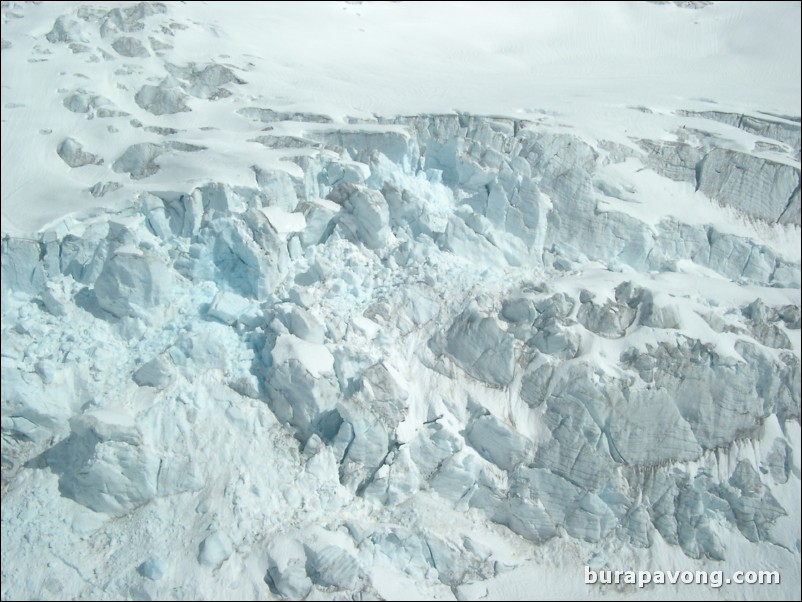 Views of the mountains, snow, icefields, etc. from inside the helicopter. Skagway.