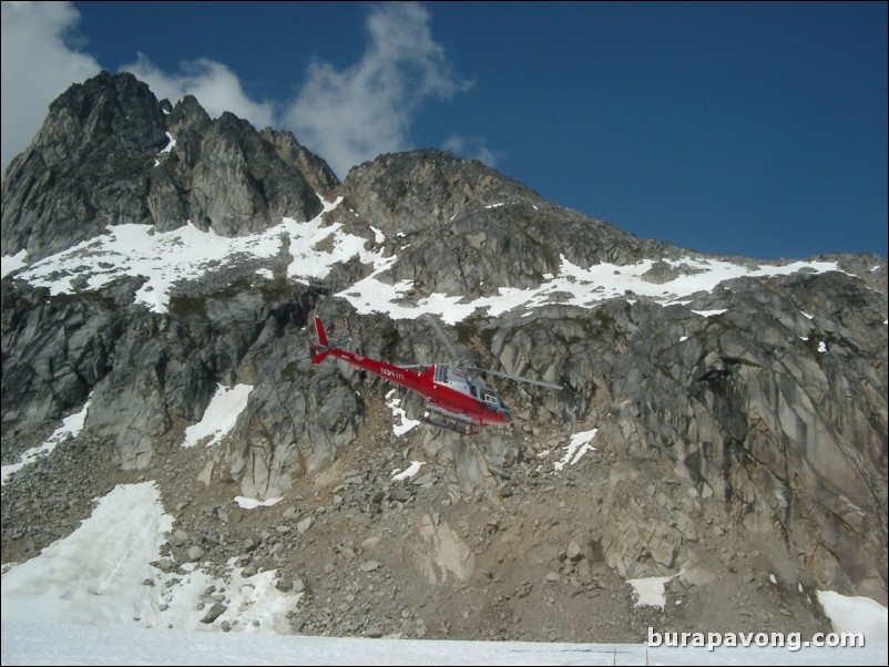 Helicopter taking off from dog sledding camp, Denver Glacier, Skagway.