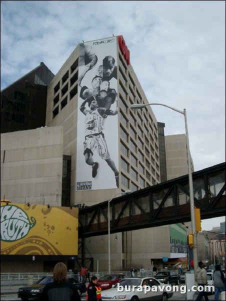 Steve Francis and other players in a Reebok advertisement on the CNN building.