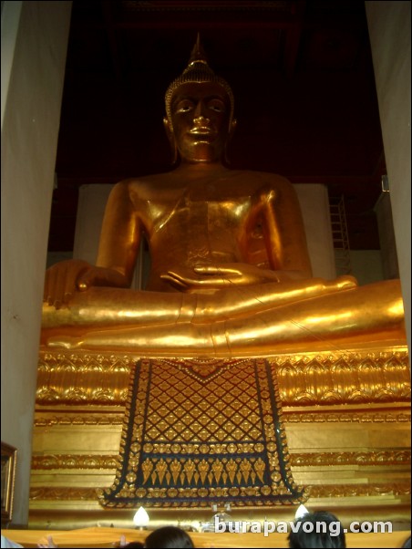 Wihan Phra Mongkol Bophit, a giant bronze Buddha image measure 17 meters tall.