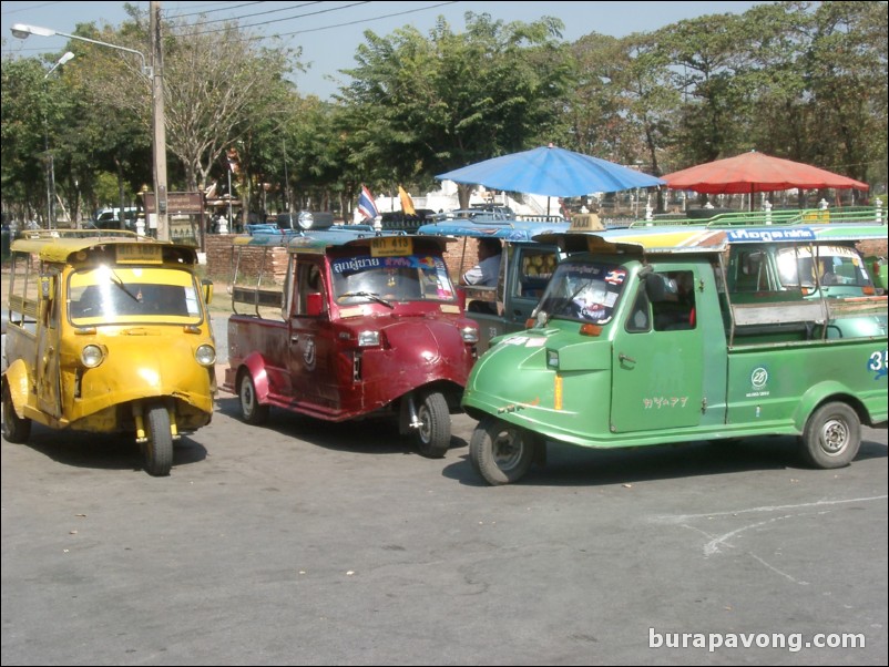 Interesting three wheeled trucks outside Phra Mongkol Bophit.