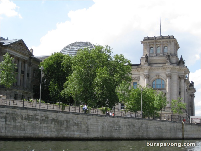 Cruising down the Spree River. Reichstag building, first parliament in the German empire.