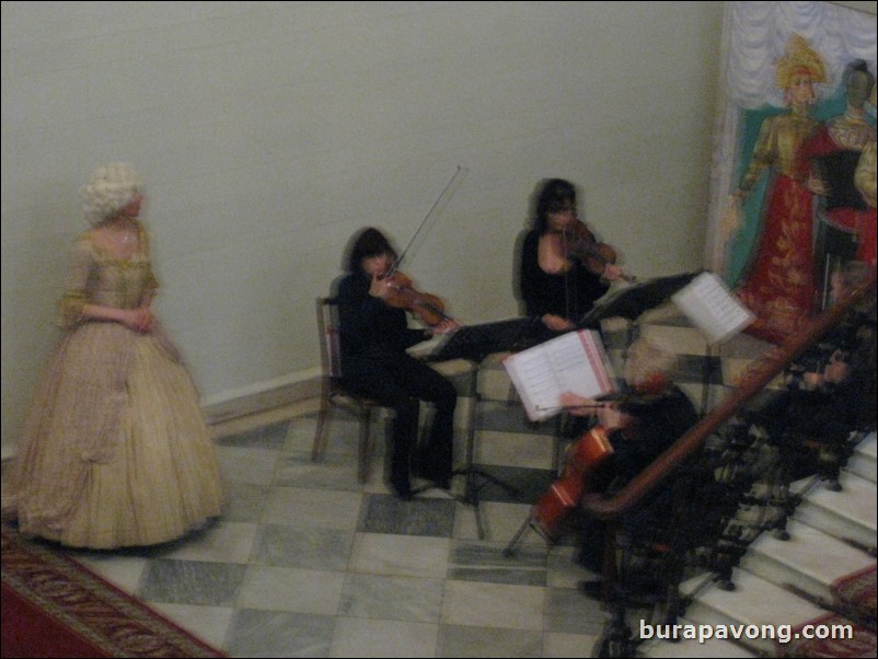 Intermission. Classical quartet plays with 