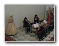 Intermission. Classical quartet plays with 