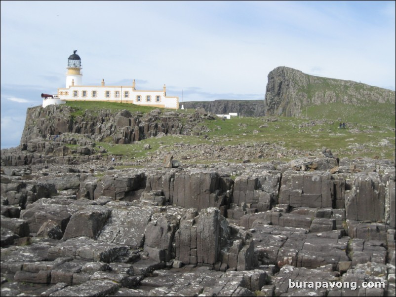 Neist Point lighthouse and rock formations.