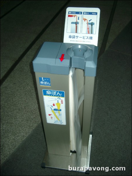 A machine used to put covers over wet umbrellas. Very common in Japan.