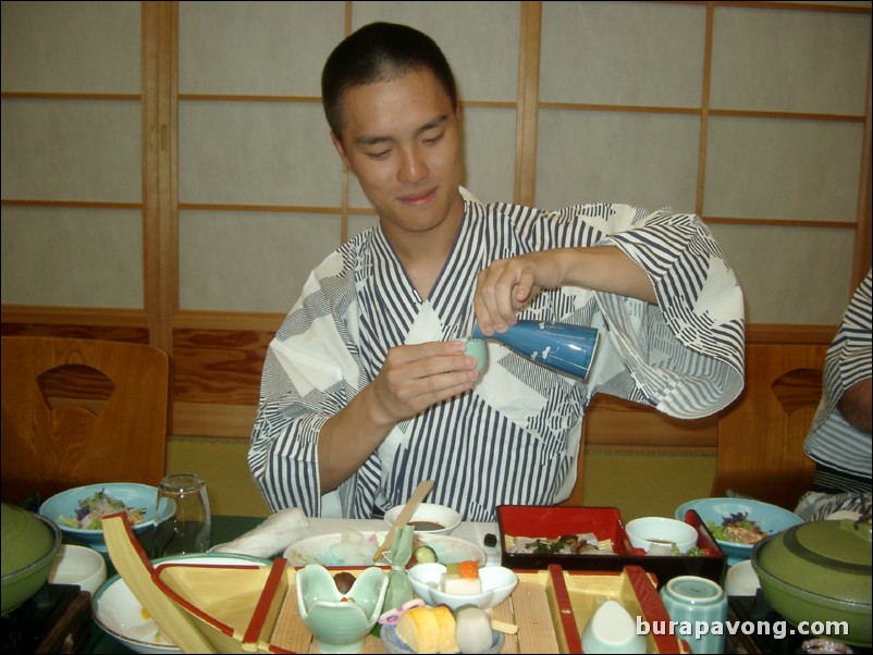 Shouenso Ryokan, Kameoka. Pouring some hot sake.