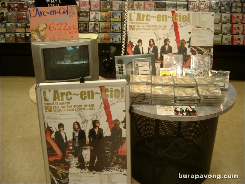 L'Arc~en~Ciel stand inside music store, AEON shopping center.