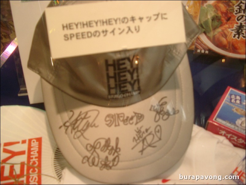 Blurry shot of Hey! Hey! Hey! Music Champ hat signed by SPEED (Shimabukuro Hiroko, Imai Eriko, Uehara Takako, Arakaki Hitoe).