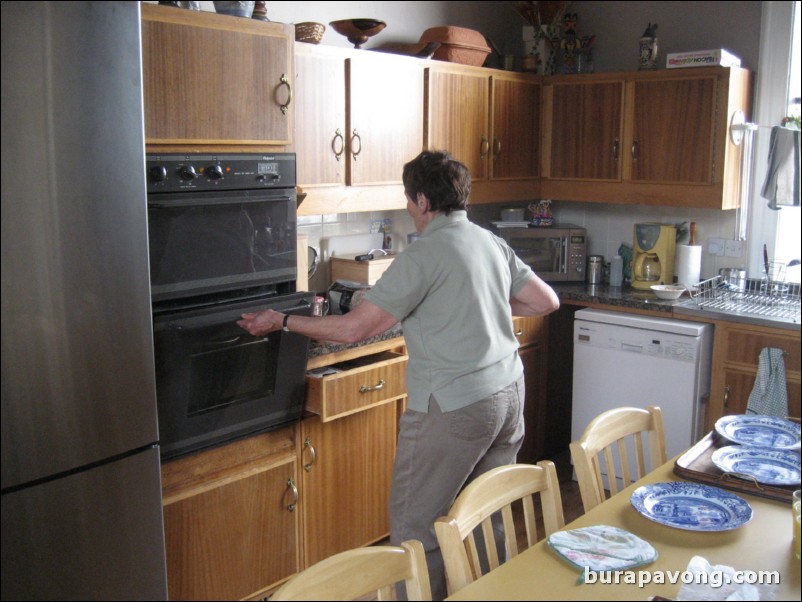 Mrs. Hippisley making breakfast.