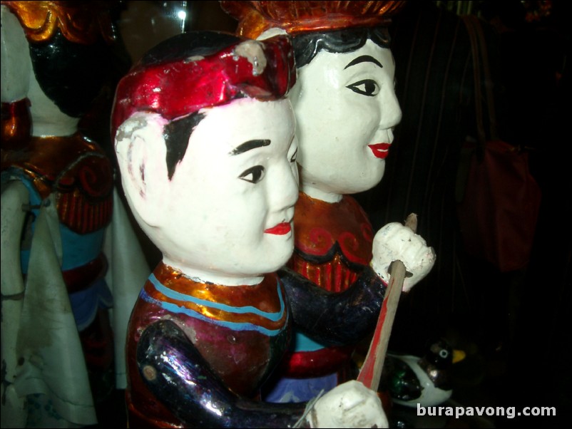 Closeup of some previously used Vietnamese water puppets.